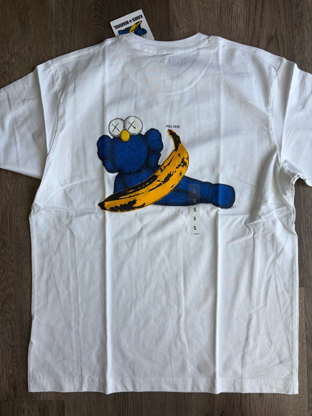 Uniqlo x KAWS White Tee with Blue Character and Yellow Banana